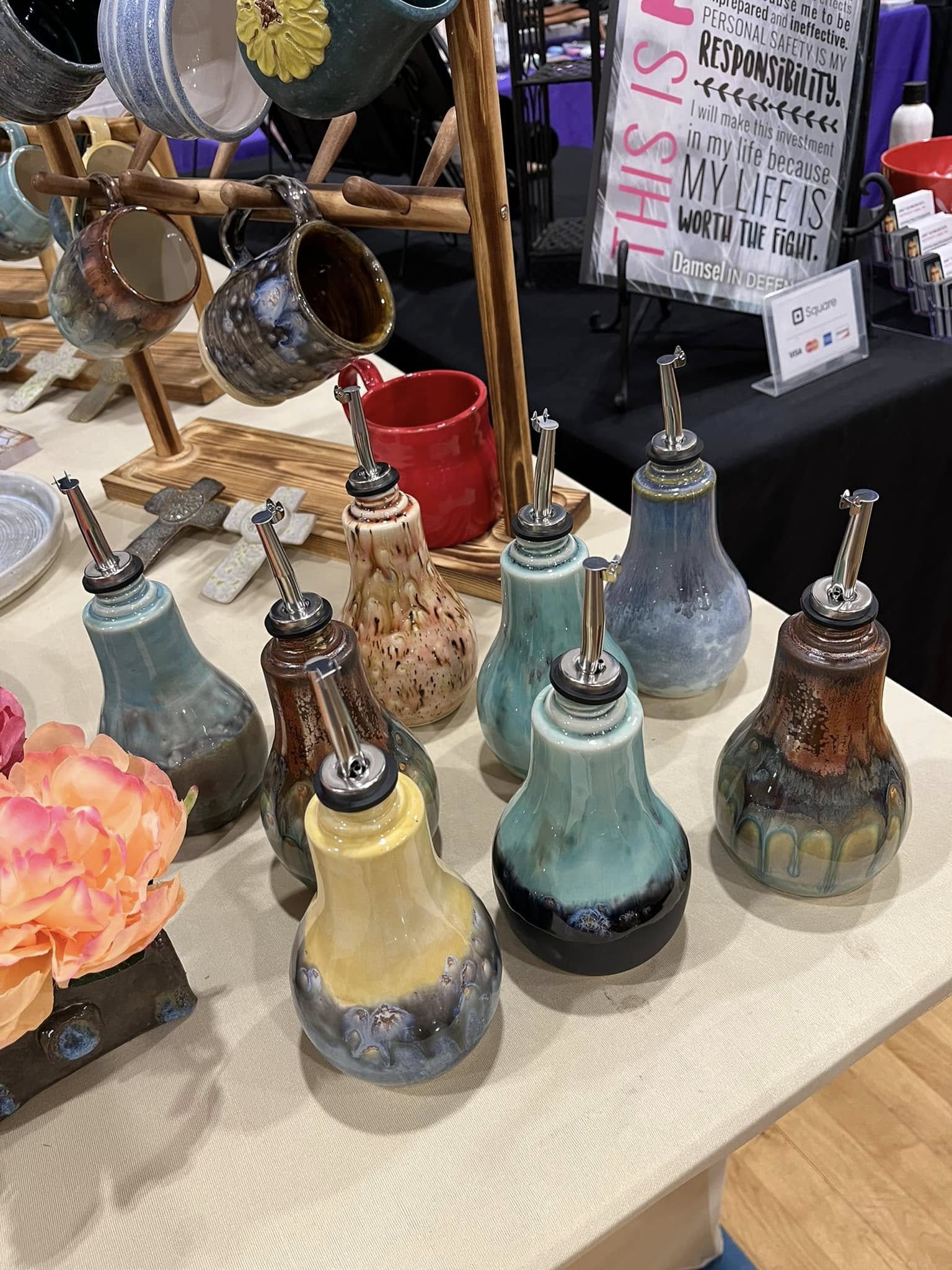 Colorful ceramic oil pourers with varied glazes
